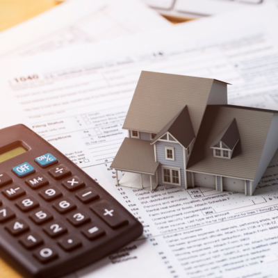 Calculator, forms, and a house